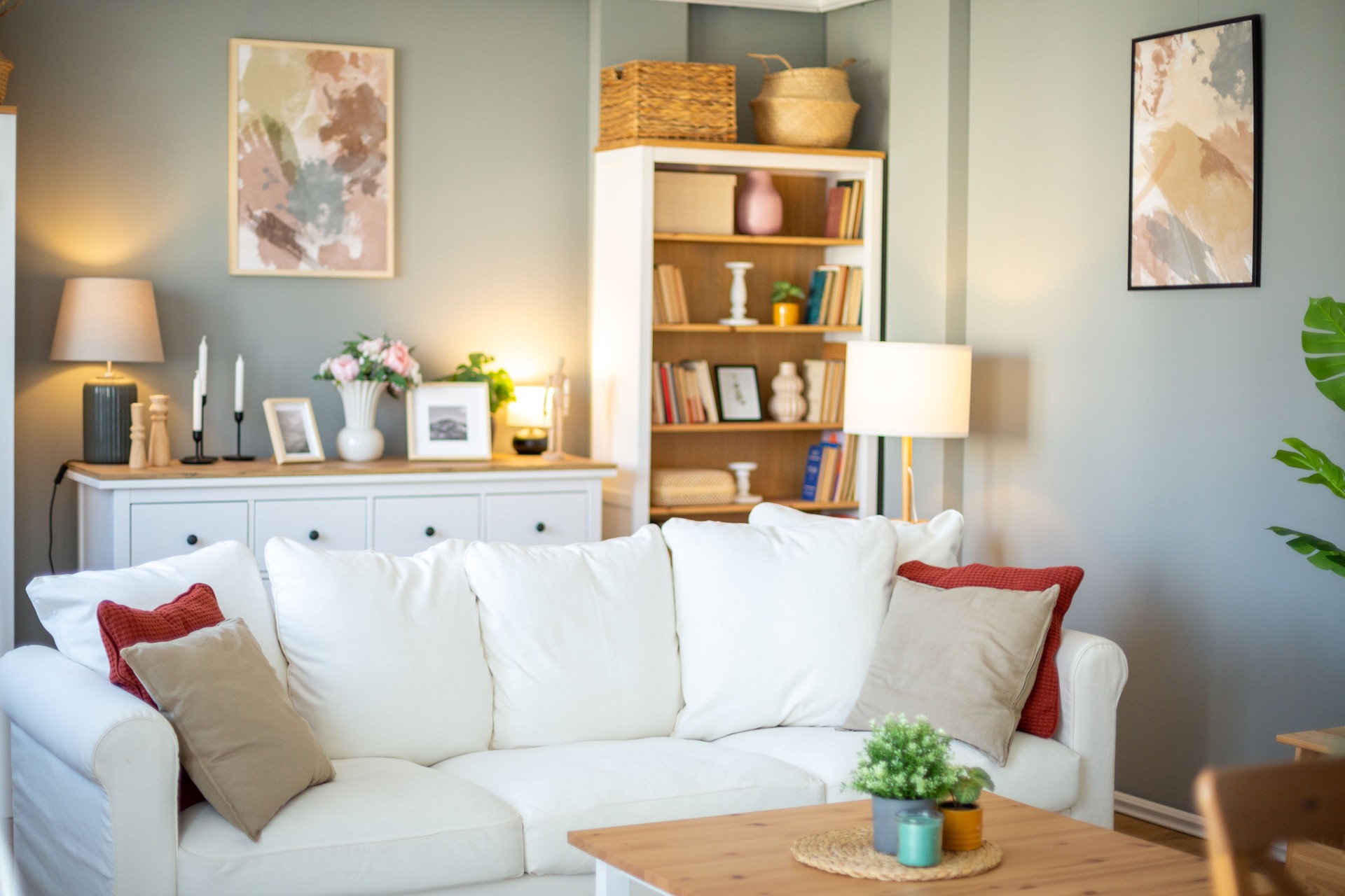 Modern living room interior design featuring white sofa and wooden furniture